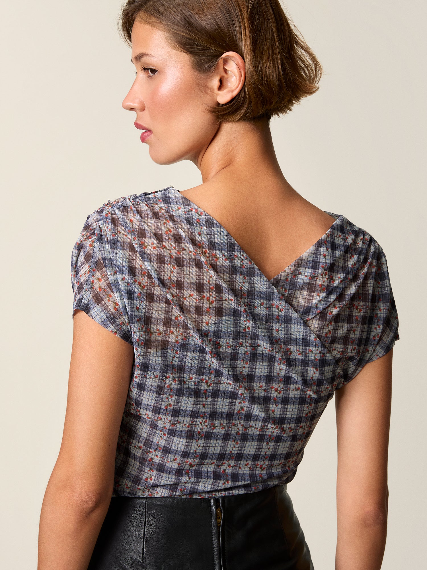 ODENA slate floral tablecloth print mesh draped top, front view by Rouje