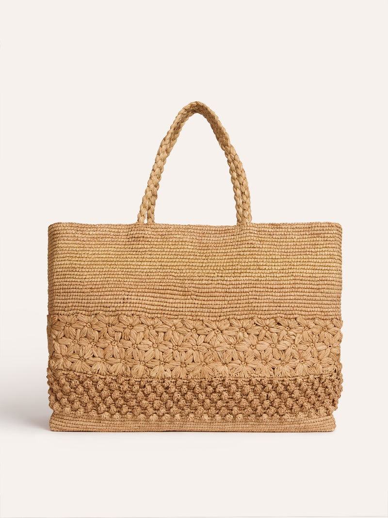 BIG SQUARE natural raffia basket bag worn on a model by Rouje