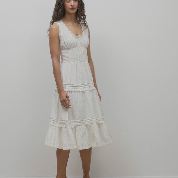 Video of the Roselene white maxi dress worn by a model
