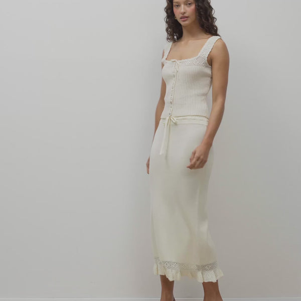 Video of Lester ecru maxi knit and crochet skirt worn by a model